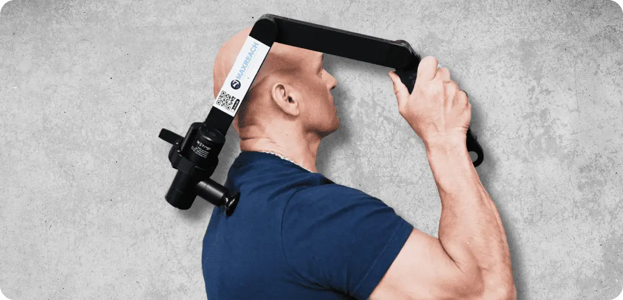 Man using neck exercise device on head.